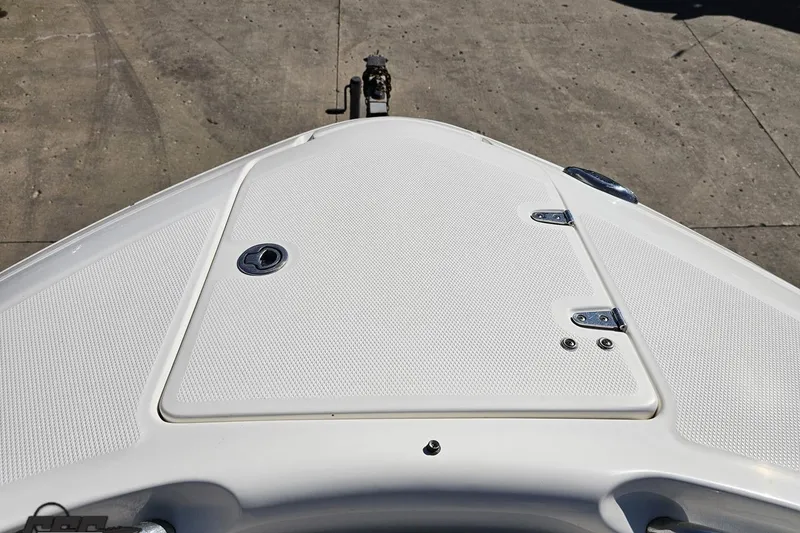 Slide: The Image of Bow view of 2010 Chaparral 276 SSX boat on a concrete surface. - 94