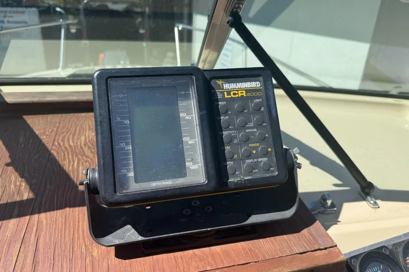 Slide: The Image of Humminbird LCR 4000 fish finder on 1985 Invader 20 boat dashboard. - 18
