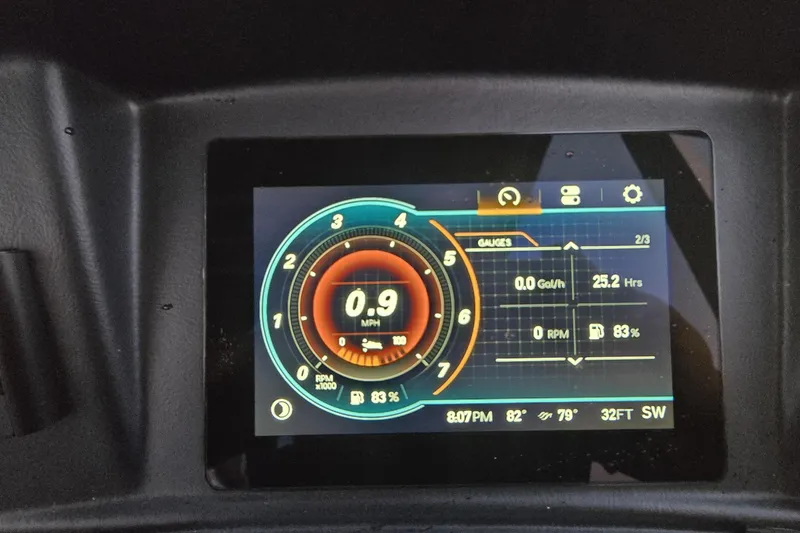 Slide: The Image of Dashboard display of 2023 Avalon Catalina 2585 CRFS Funship showing speed and gauges. - 12