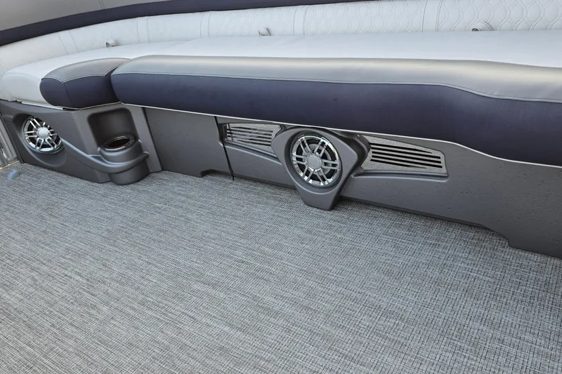 Slide: The Image of 2023 Avalon Catalina 2585 CRFS Funship interior with cushioned seating and built-in speakers. - 15