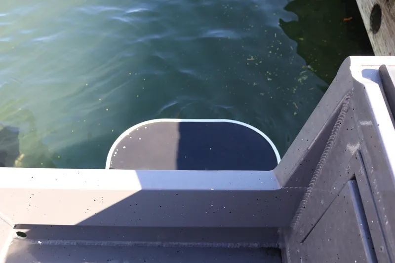 Slide: The Image of Alumaweld Stryker 220 boat platform over water, 2026 model. - 19