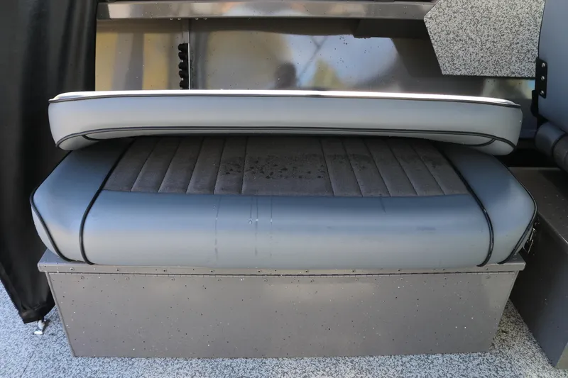 Slide: The Image of 2026 Alumaweld Stryker 220 boat seat with gray upholstery and storage compartment. - 25
