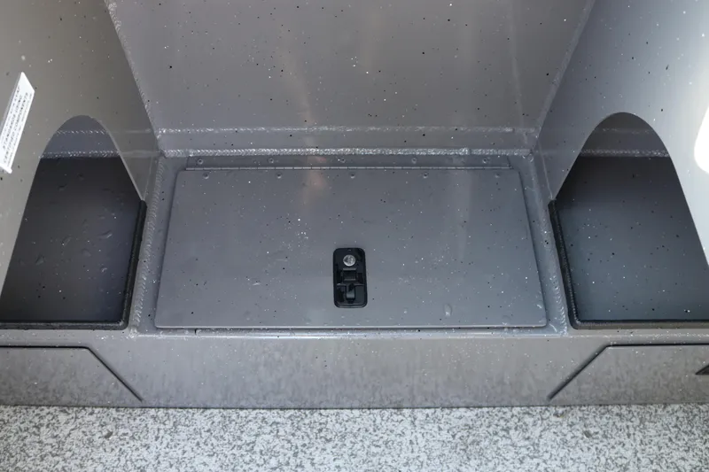 Slide: The Image of Alumaweld Stryker 220 (2026) storage compartment with secure latch and durable finish. - 26