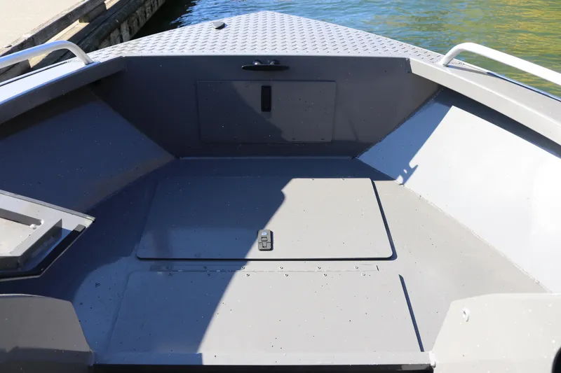 Slide: The Image of 2026 Alumaweld Stryker 220 boat interior, featuring a spacious, durable deck design. - 32