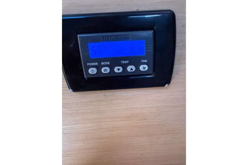 Slide: The Image of Control panel on a 2008 Beneteau First 50 yacht displaying temperature settings. - 14