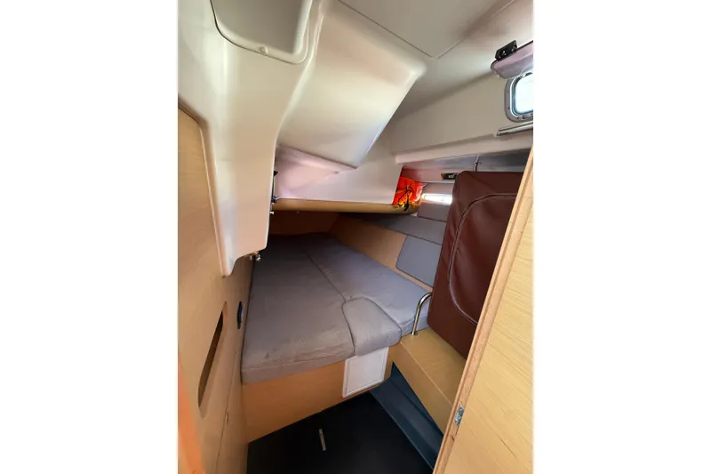 Slide: The Image of Interior cabin of 2008 Beneteau First 50 sailboat, featuring cozy sleeping quarters. - 25