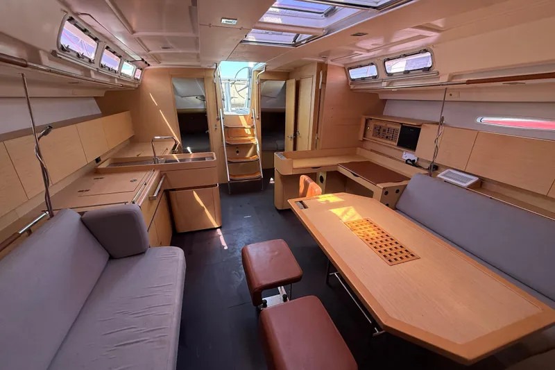 Slide: The Image of Luxurious interior of a 2008 Beneteau First 50 yacht with modern furnishings and ample natural light. - 27