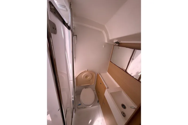 Slide: The Image of Bathroom interior of 2008 Beneteau First 50 yacht, featuring modern fixtures and compact design. - 30