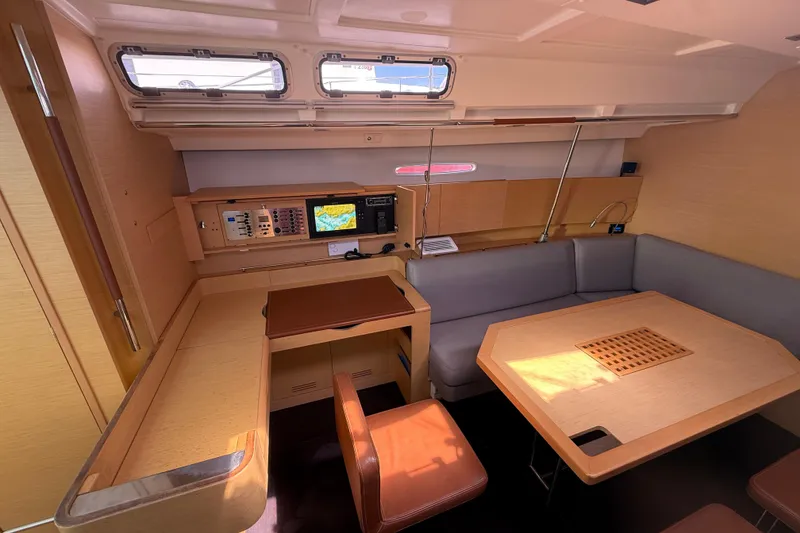 Slide: The Image of Interior of 2008 Beneteau First 50 yacht with navigation station and dining area. - 37