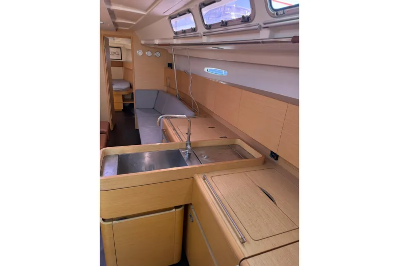 Slide: The Image of Interior of 2008 Beneteau First 50 yacht with modern kitchen and seating area. - 40