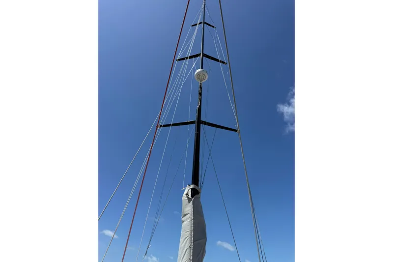 Slide: The Image of Mast of 2008 Beneteau First 50 sailboat against clear blue sky. - 6