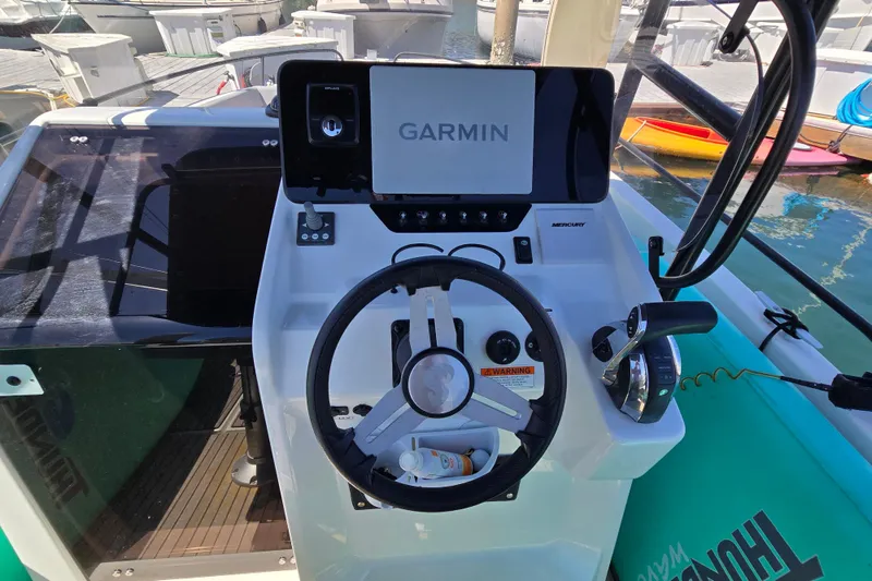 Slide: The Image of Helm of 2023 Beneteau Flyer 8 SPACEdeck with Garmin navigation system. - 12