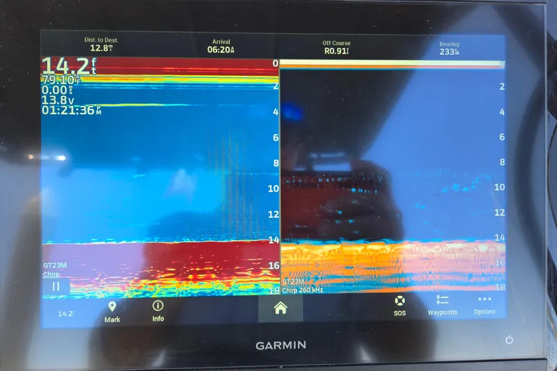 Slide: The Image of Garmin marine display on 2023 Beneteau Flyer 8 SPACEdeck showing navigation and sonar data. - 19