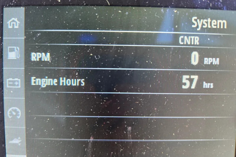 Slide: The Image of Display screen showing 57 engine hours and 0 RPM on a 2023 Beneteau Flyer 8 SPACEdeck. - 22