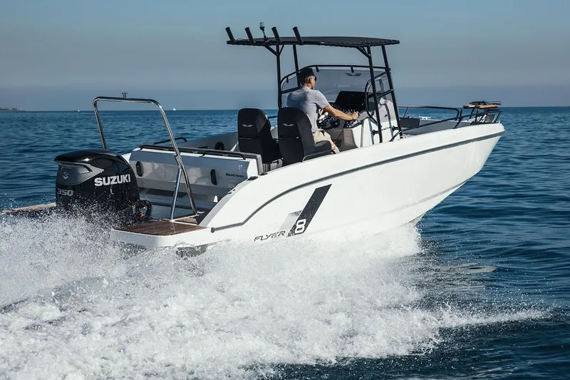 Slide: The Image of 2023 Beneteau Flyer 8 SPACEdeck cruising on open water with Suzuki engine. - 25