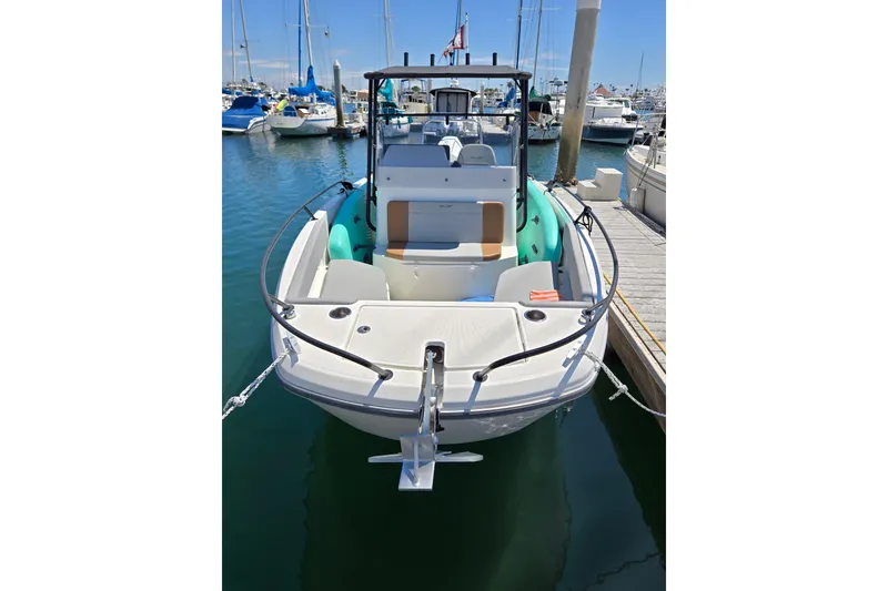 Slide: The Image of 2023 Beneteau Flyer 8 SPACEdeck boat docked in a marina. - 3