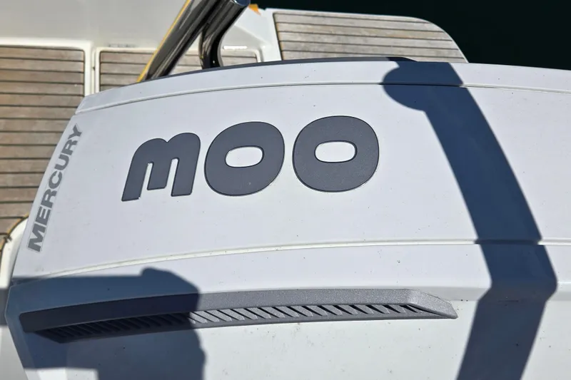 Slide: The Image of Mercury engine on 2023 Beneteau Flyer 8 SPACEdeck, featuring "MOO" text. - 8