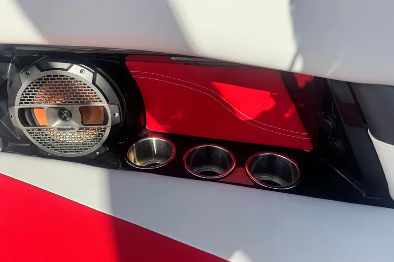 Slide: The Image of Interior of 2020 MasterCraft XStar boat with speaker and cup holders. - 28