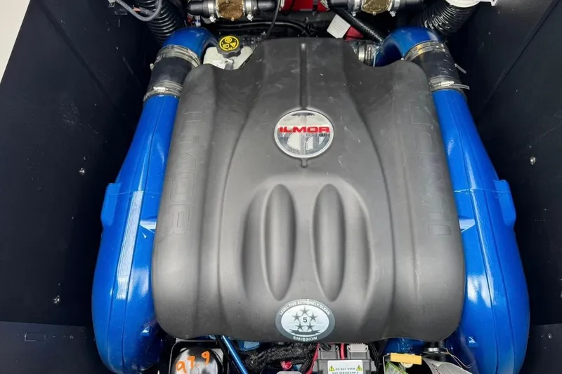 Slide: The Image of 2020 MasterCraft XStar Ilmor engine with blue accents, showcasing powerful marine performance. - 38