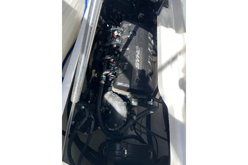 Slide: The Image of Engine compartment of 2021 Yamaha Boats 275SE, featuring SVHO engine components. - 17