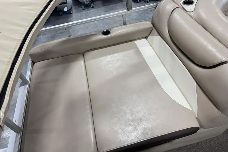 Slide: The Image of 2016 Sun Tracker Party Barge 22 XP3 beige seating area with cup holders. - 13