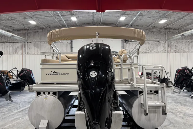 Slide: The Image of 2016 Sun Tracker Party Barge 22 XP3 pontoon boat in a warehouse setting. - 5