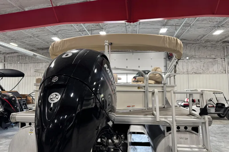 Slide: The Image of 2016 Sun Tracker Party Barge 22 XP3 pontoon boat with Mercury outboard engine in a showroom. - 7