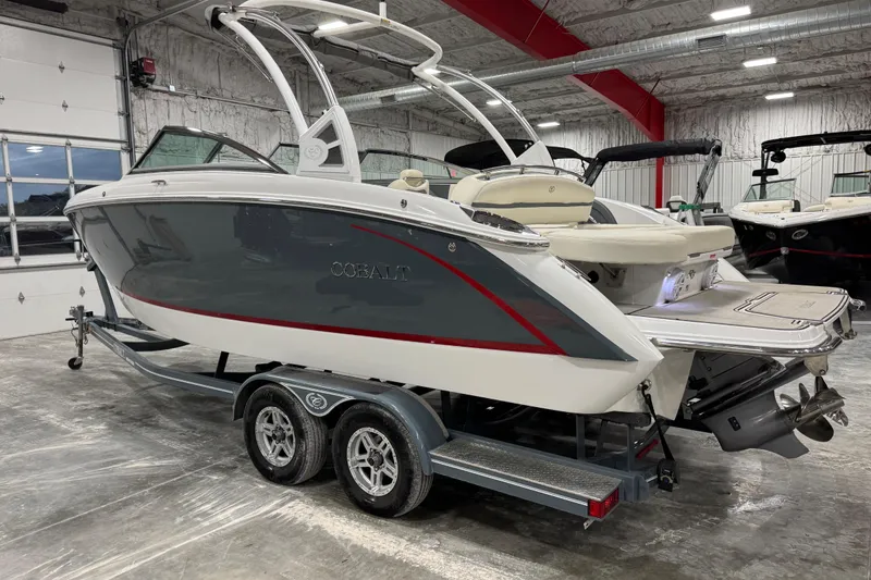 Slide: The Image of 2019 Cobalt R5 boat on trailer in indoor showroom setting. - 3