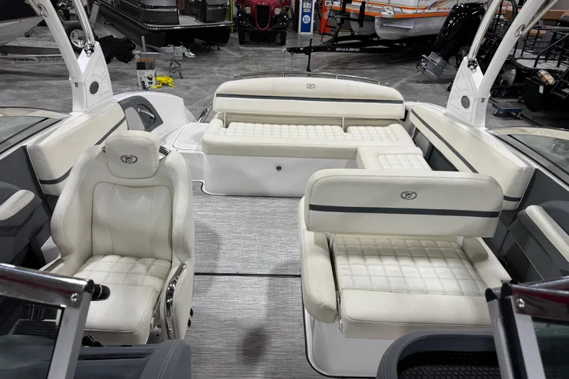 Slide: The Image of 2019 Cobalt R5 boat interior with luxurious white seating and modern design. - 5