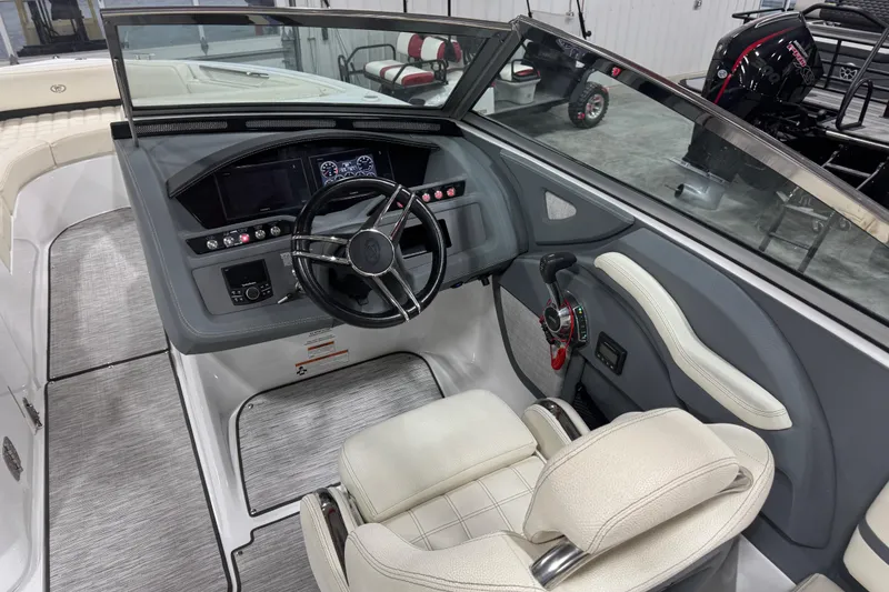 Slide: The Image of 2019 Cobalt R5 boat cockpit with steering wheel and control panel. - 9