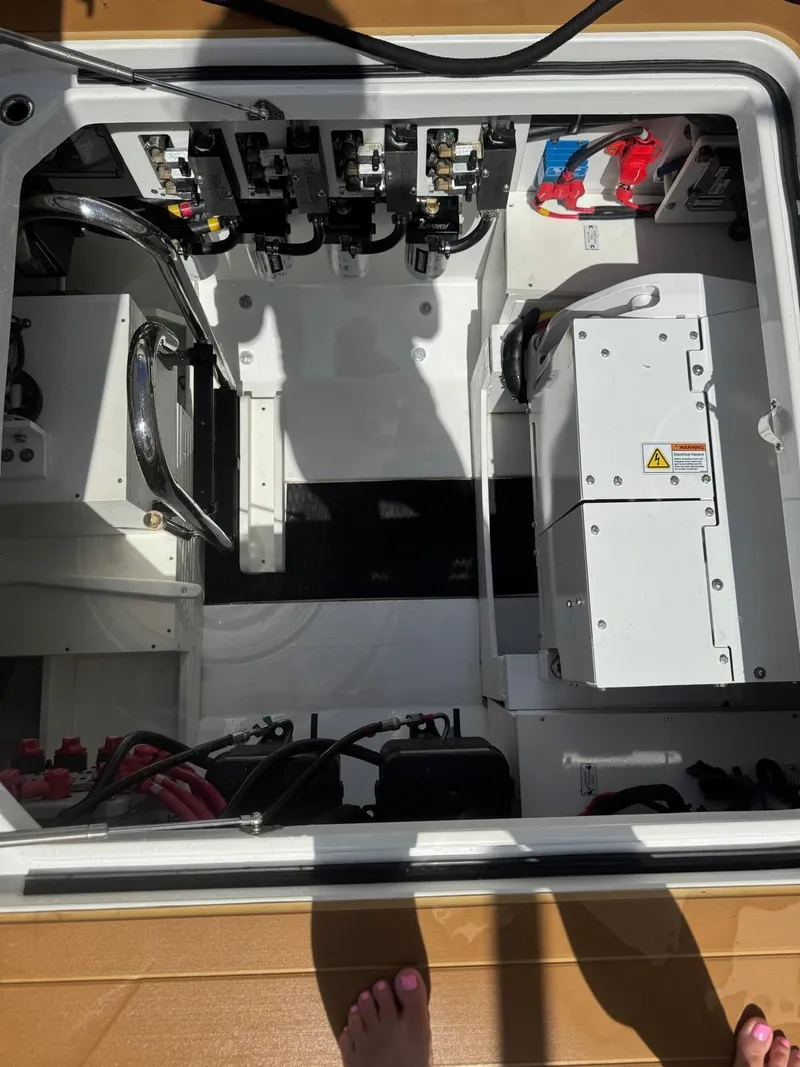 The Image of Interior view of a 2024 HCB 42 Lujo boat engine compartment. - 0