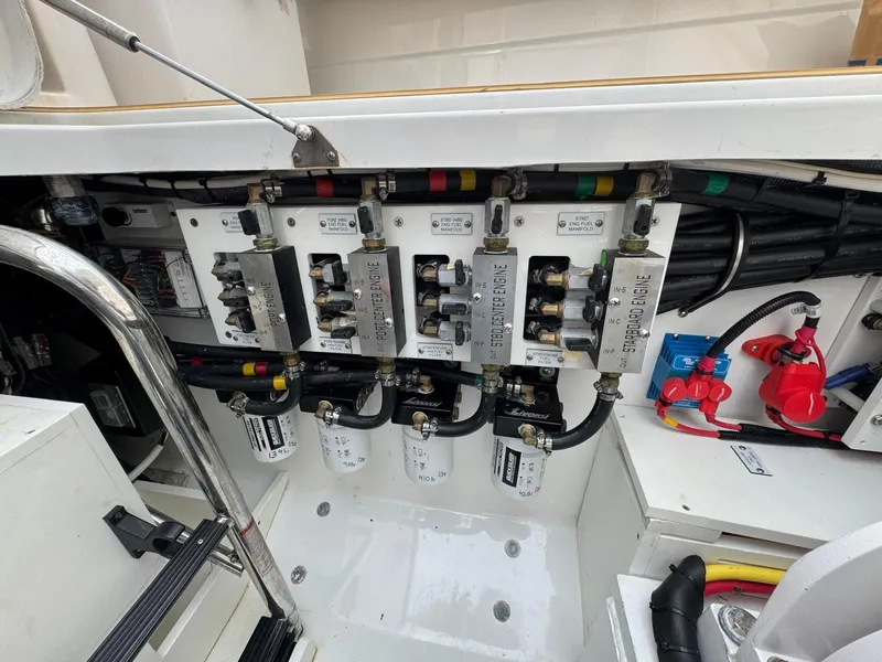 Slide: The Image of Engine compartment of 2024 HCB 42 Lujo with wiring and filters. - 25