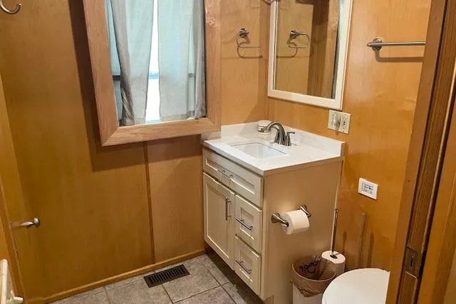 Slide: The Image of Bathroom interior of 2003 Fantasy 18x80 Houseboat with wooden accents and modern fixtures. - 24