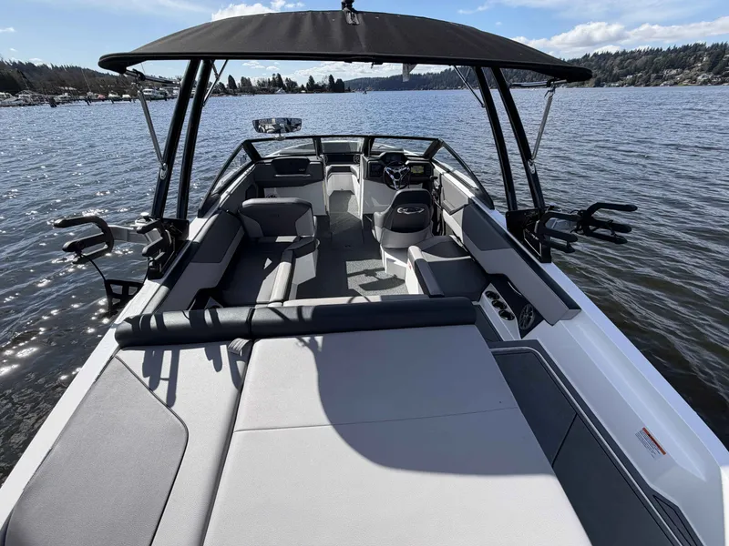 Slide: The Image of Rear view of 2025 Cobalt CS23 Surf on water. - 11