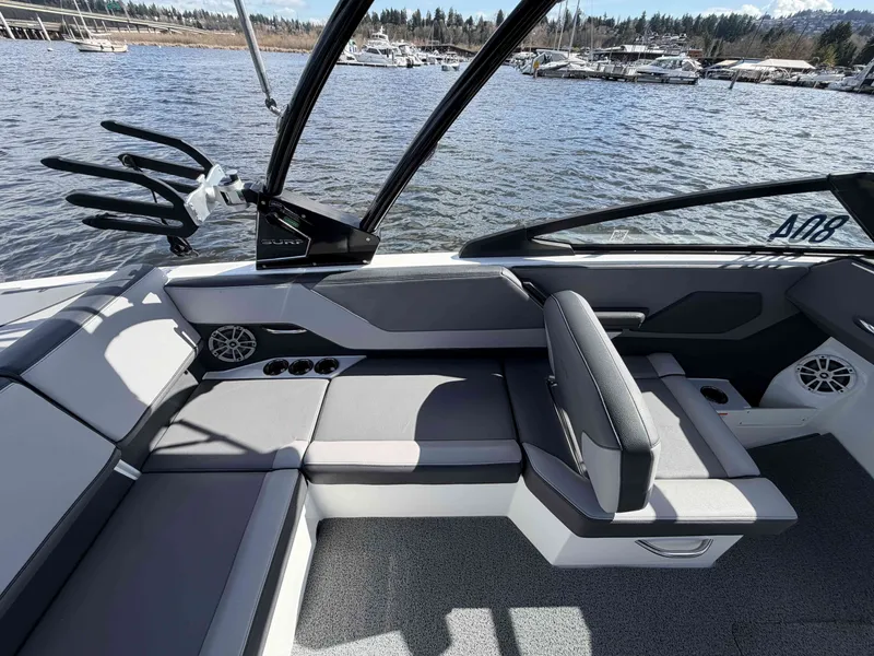 Slide: The Image of Interior of 2025 Cobalt CS23 Surf boat on a lake. - 14