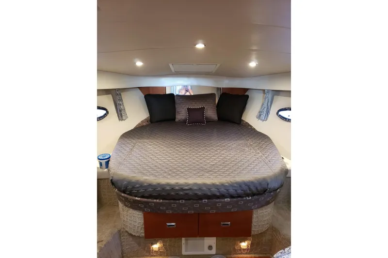 Slide: The Image of Luxurious cabin interior of 2007 Formula 34 Performance Cruiser with cozy bedding. - 13