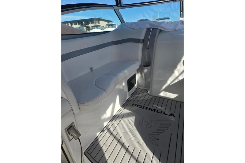 Slide: The Image of 2007 Formula 34 Performance Cruiser interior with seating and branded flooring. - 19