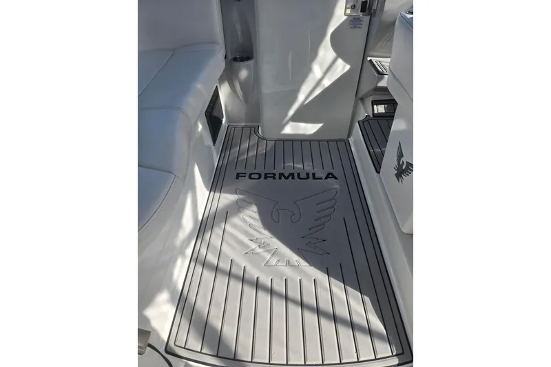Slide: The Image of 2007 Formula 34 Performance Cruiser interior with branded floor mat and seating. - 20