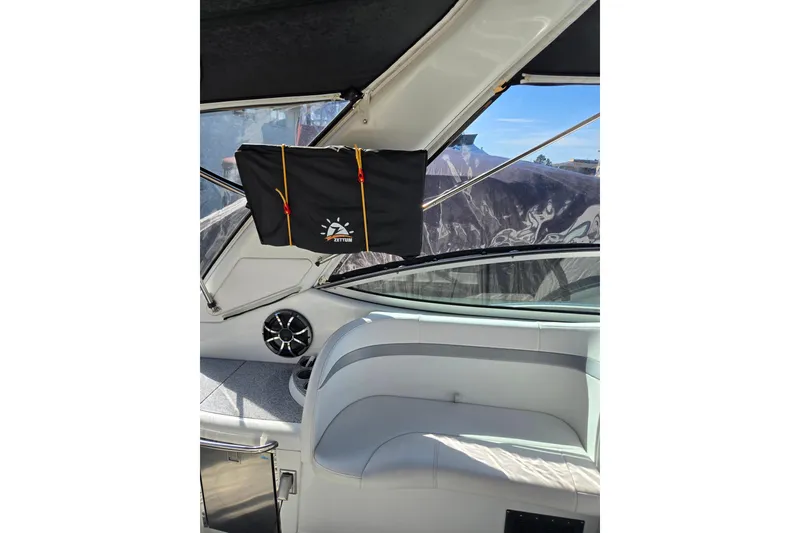 Slide: The Image of Interior of a 2007 Formula 34 Performance Cruiser with seating and a mounted speaker. - 5