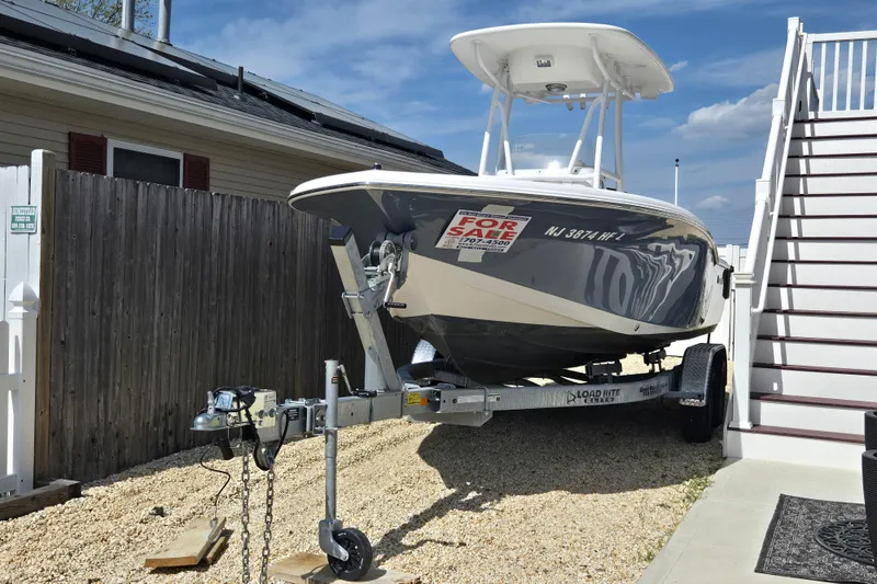 The Image of 2013 Tidewater 210 LXF boat on trailer, for sale sign displayed. - 0