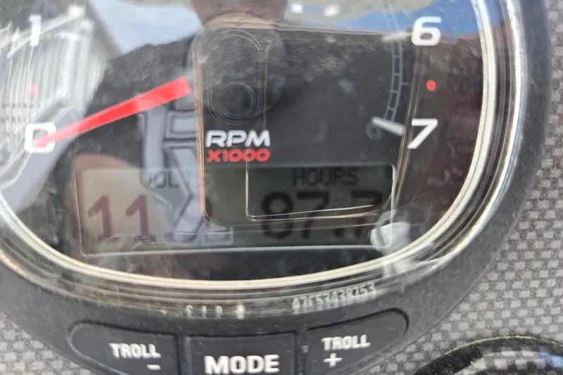 Slide: The Image of Close-up of a 2013 Tidewater 210 LXF boat tachometer showing 977 hours. - 18