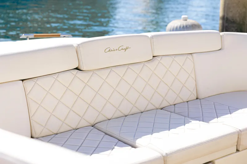 Slide: The Image of Luxurious seating on 2021 Chris-Craft Corsair 34 boat with quilted upholstery design. - 16