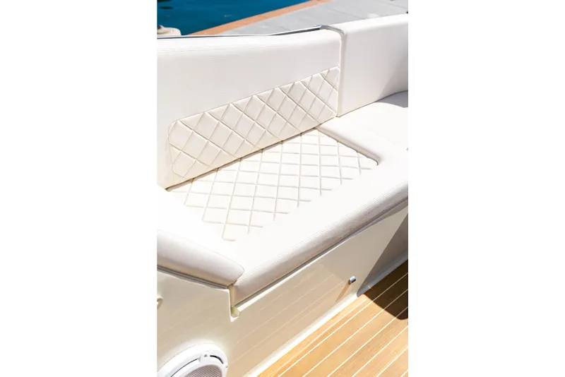 Slide: The Image of Luxurious seating on 2021 Chris-Craft Corsair 34 boat with quilted upholstery. - 17