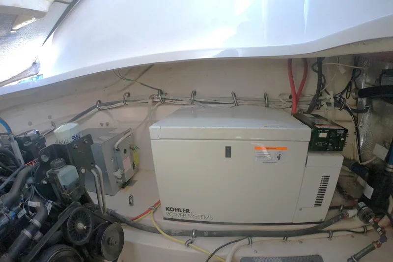 Slide: The Image of Engine compartment of 2003 Chaparral 320 Signature with Kohler 5KW . - 16
