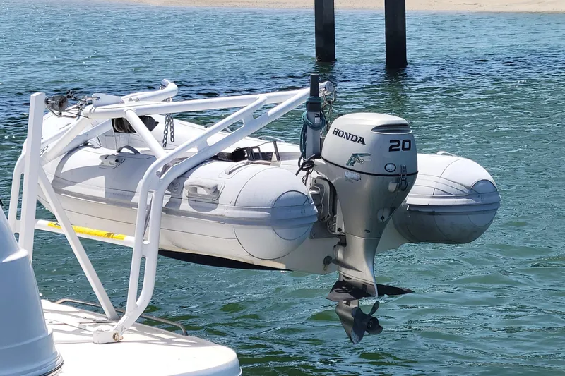 Slide: The Image of RIB with Honda 20HP outboard motor on Davit Lift Chaparral 320 Signature, 2003 model. - 6
