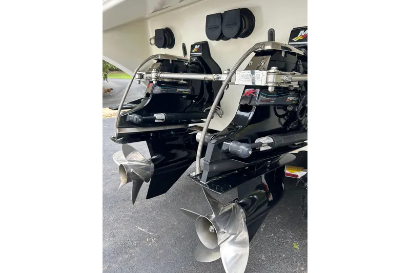 Slide: The Image of 2002 Fountain 38 Lightning boat with dual Mercury outboard engines. - 18