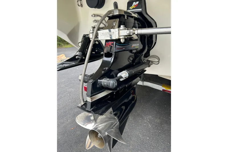 Slide: The Image of Outboard motor of 2002 Fountain 38 Lightning boat with Mercury Racing components. - 19