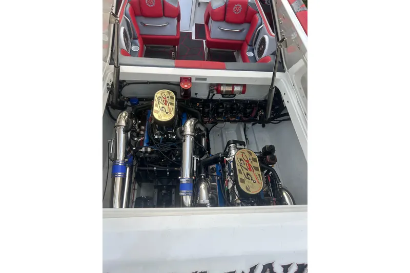 Slide: The Image of Engine compartment of a 2002 Fountain 38 Lightning boat with twin engines. - 27