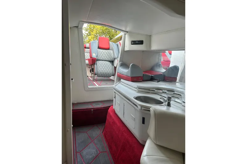 Slide: The Image of Interior of 2002 Fountain 38 Lightning boat with modern seating and kitchenette. - 34