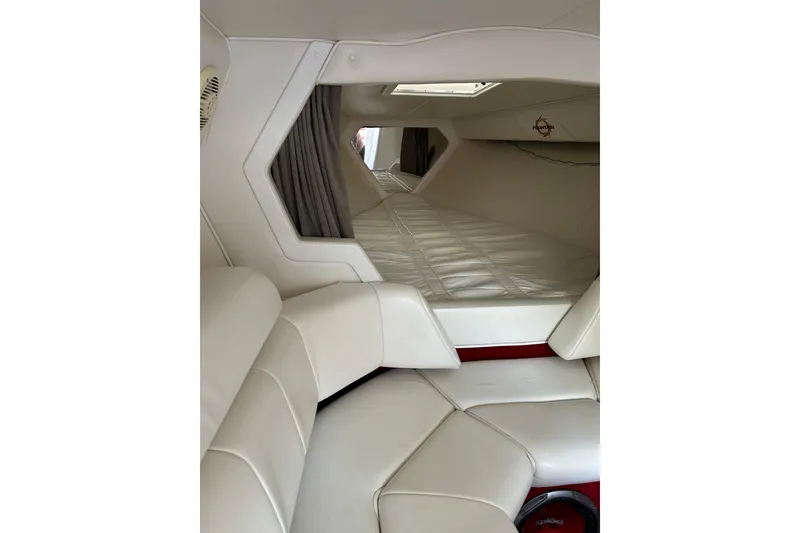 Slide: The Image of Interior of 2002 Fountain 38 Lightning boat with white leather seating. - 39